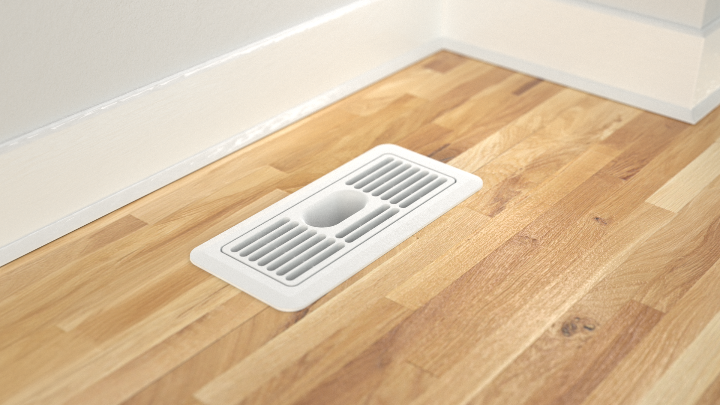 Sleek design of the EverVent floor register closeup on wood